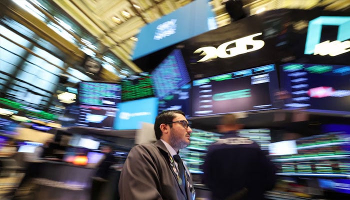 A trader walks, while working on the floor at the New York Stock Exchange (NYSE) in New York City, U.S., April 22, 2025.—Reuters