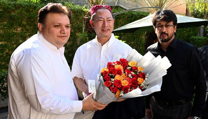 South Punjab Additional Chief Secretary Fuad Hashim Rabbani (left) presents flowers bouquet to Japan’s Ambassador Akamatsu Shuichi (centre) on April 24, 2025. — Facebook@ACSSouthPunjab