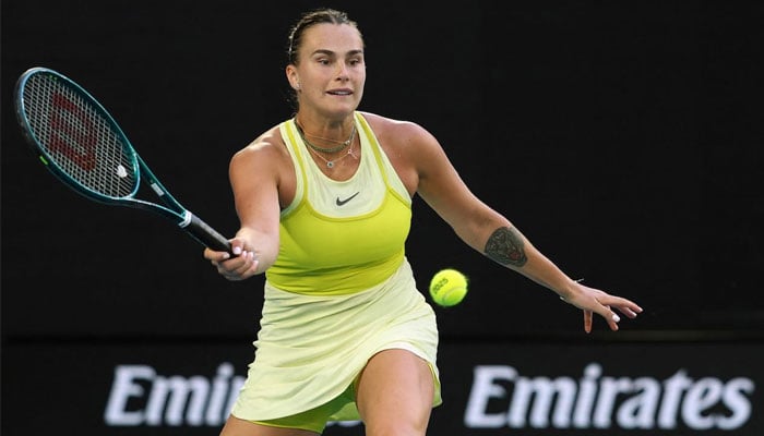 Belarus’ Aryna Sabalenka hits a shot against USA’s Sloane Stephens during their women’s singles match on day one of the Australian Open tennis tournament in Melbourne on January 12, 2025. —AFP