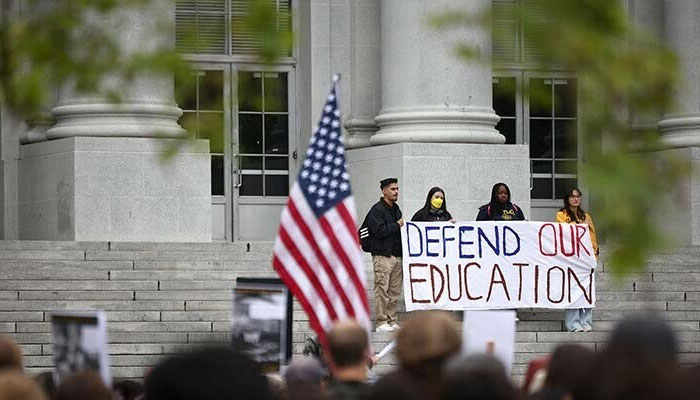 Demonstrators hold a banner during a ‘Stand Up for Internationals’ rally on the campus of Berkeley University in Berkeley, California, US on April 17, 2025. — Reuters