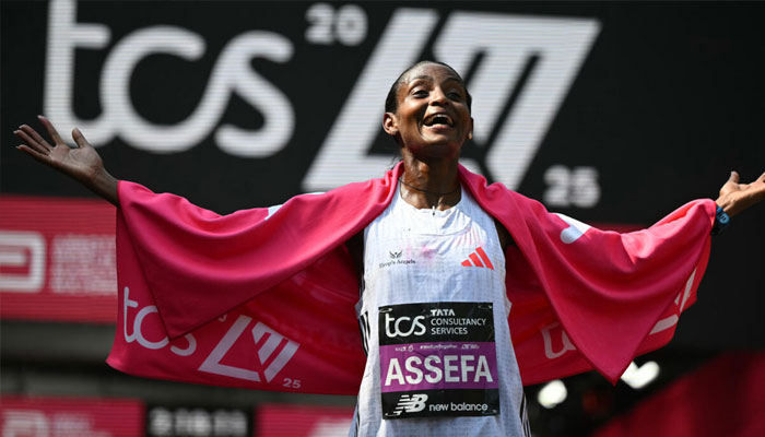 Ethiopias Tigst Assefa celebrating. —AFP/File
