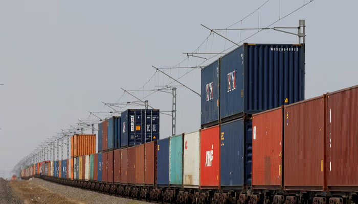 Containers are transported by train near the Deendayal Port in Kandla, in the western state of Gujarat, India, April 5, 2025. —Reuters