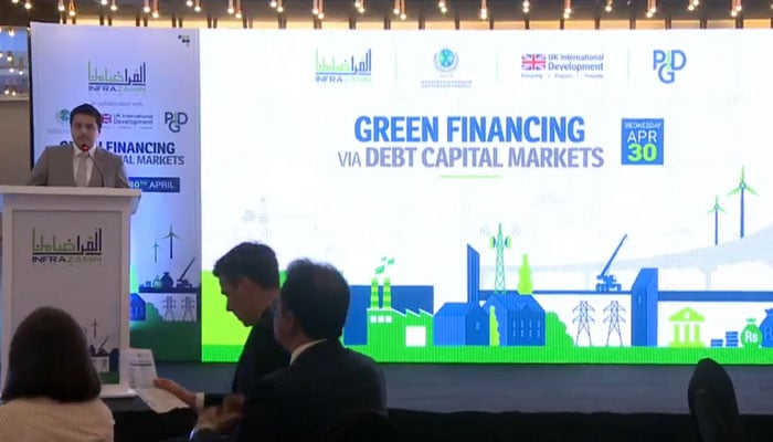 Participant speaks in a high-level seminar titled “Green Financing via Debt Capital Markets,” on April 30, 2025. — Screengrab via Faxcebook@InfraZaminPakistan
