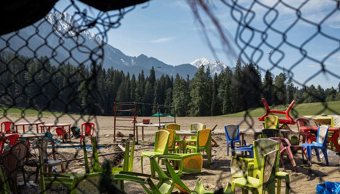 Chairs and tables are scattered at the site of an attack on tourists in Baisaran near Pahalgam in IIOJKs Anantnag district on April 24, 2025. — Reuters
