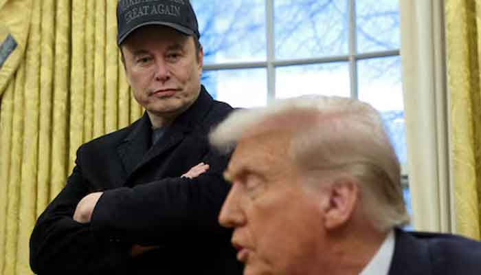 Elon Musk listens to US President Donald Trump speak in the Oval Office of the White House in Washington, DC, US, February 11, 2025. — Reuters