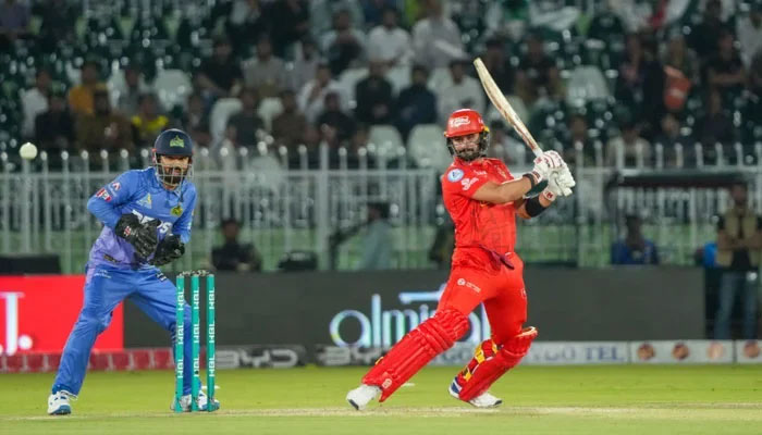 Islamabad Uniteds Sahibzada Farhan (right) plays a shot while Multan Sultans skipper looks on during the PSL 10 match at Rawalpindi Cricket Stadium on April 16, 2025. — PCB
