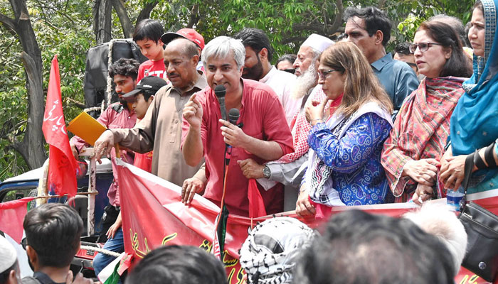 Labour leader Dr Taimur-ur-Rehman addressing during Workers Rally on Mall Road on the occasion of International Workers Day on May 1, 2025. — APP