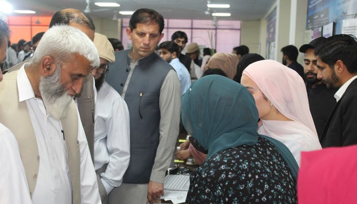 Special Assistant to the Chief Minister Khyber Pakhtunkhwa on Industries Abdul Karim Tordher looking at students projects during annual exhibition of final-year projects at the PAF-IAST on April 30, 2025. — Facebook@paf.iast