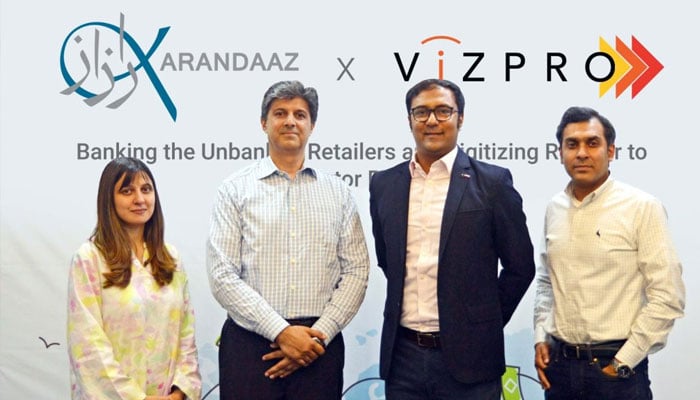 Karandaaz and Vizpro officials seen at an event.— APP/File