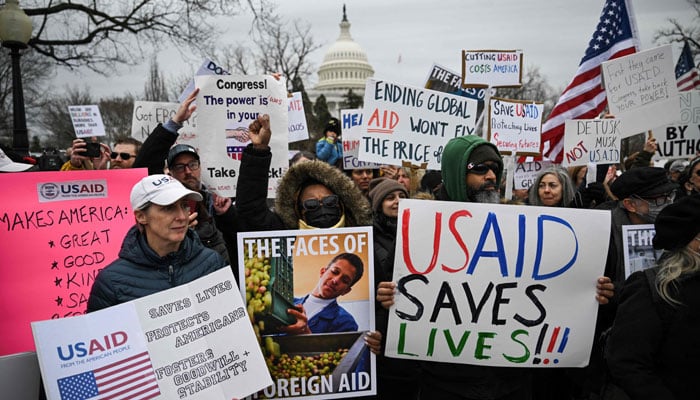 People protest against the administration of US President Donald Trumps decision to virtually shut down the USAID at the US Capitol in Washington, DC, on February 5, 2025. — AFP