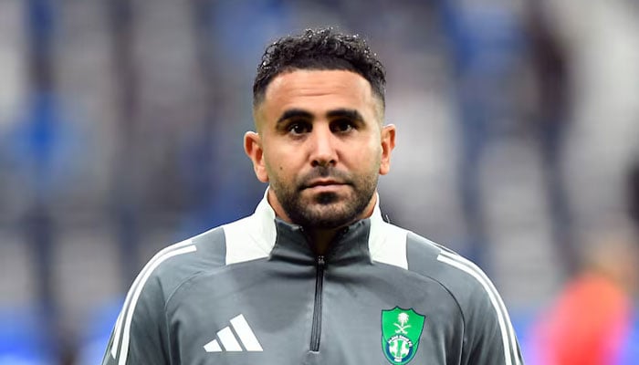 Al Ahlis Riyad Mahrez during the warm up before the match. — Reuters/File