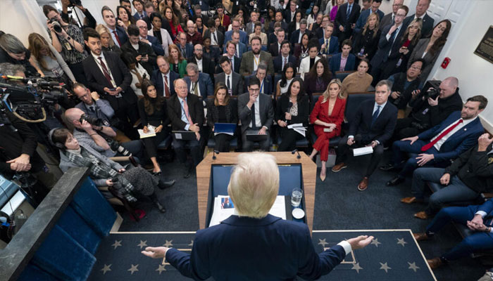 President Donald Trump speaks with reporters at the White House on 30 January 2025. — AFP