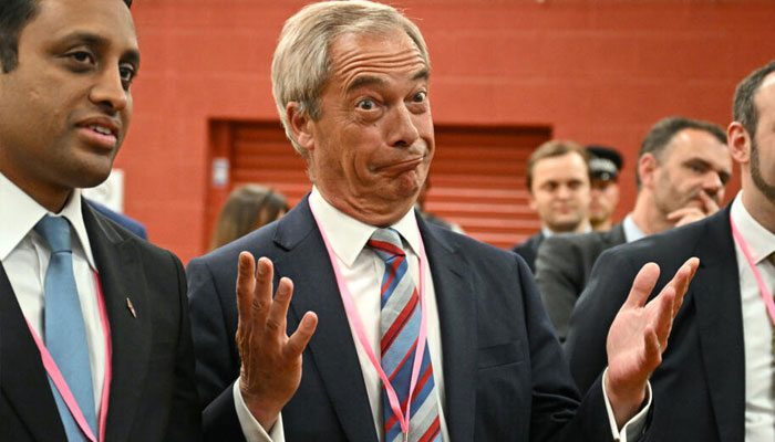 Nigel Farage, leader of the Reform UK party, celebrates the victory of Sarah Pochin, the party’s candidate, in the Runcorn and Helsby by-election in Widnes, north-west England, in the early hours of 2 May 2025. —AFP