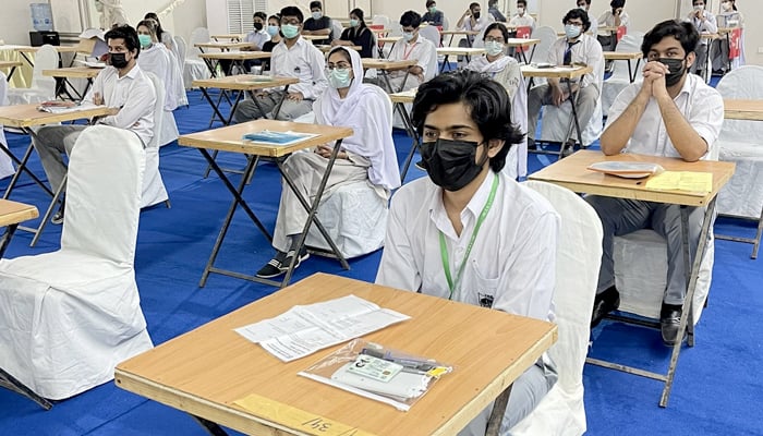 Students can be seen in an examination hall in Karachi on April 26, 2021, as Cambridge exams are underway in Pakistan. — X/Deputy Commissioner South Karachi