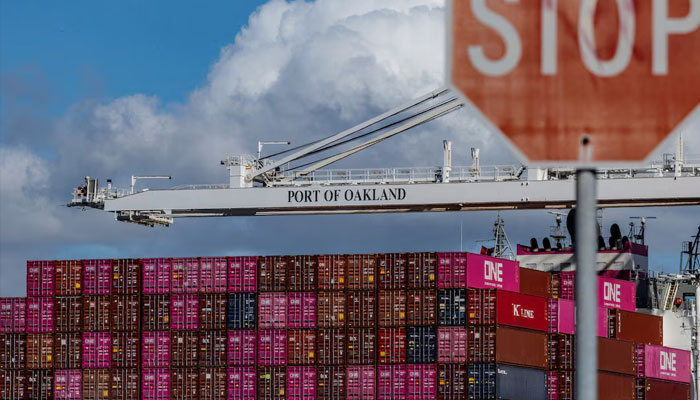 A cargo ship full of shipping containers is seen at the port of Oakland as trade tensions escalate over US tariffs, in Oakland, California, US, March 6, 2025.—Reuters
