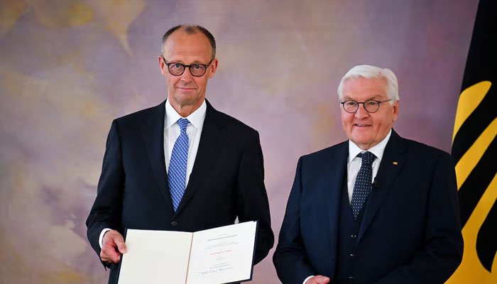 Incoming German Chancellor Friedrich Merz receives his certificate of appointment from German President Frank-Walter Steinmeier during a ceremony at Bellevue Palace in Berlin, Germany May 6, 2025. —Reuters