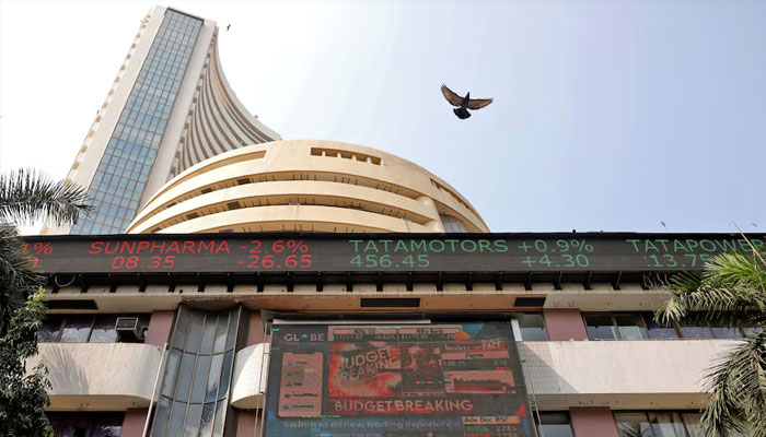A bird flies past a screen displaying the Sensex results on the facade of the Bombay Stock Exchange (BSE) building in Mumbai, February 1, 2023.—Reuters