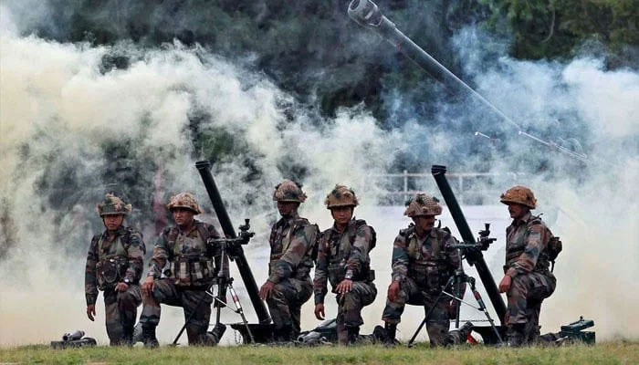 Indian Army soldiers participate in a war exercise during a two-day Know Your Army exhibition in Ahmedabad, India, August 19, 2016. — Reuters