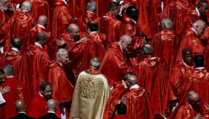 Cardinals embrace after late Pope Francis funeral ceremony at St Peters Square at the Vatican on April 26, 2025. — AFP