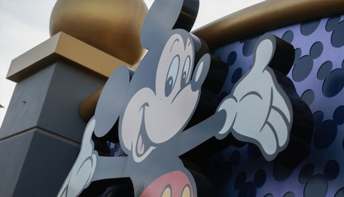 Mickey Mouse welcomes visitors near an entrance to Walt Disney World in Orlando, Florida. —AFP/File