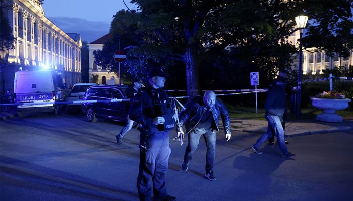 Polish police secure an area at the Warsaw University campus after an attack with an axe, in Warsaw, Poland, May 7, 2025.—Reuters