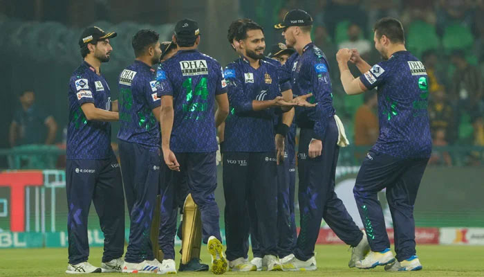 Quetta Gladiators Faheem Ashraf (centre) celebrates dismissing Peshawar Zalmis Saim Ayub during their PSL 10 match at the Gaddafi Stadium in Lahore on April 26, 2025. — PCB