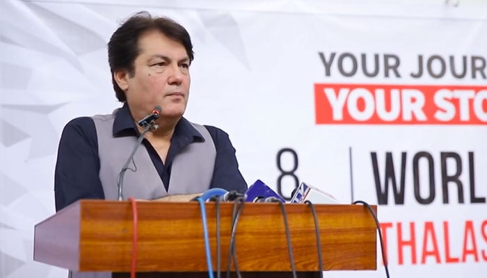 Advisor to Khyber Pakhtunkhwa Chief Minister for Information Barrister Muhammad Ali Saif  as the chief guest addresses a seminar to mark the World Thalassemia Day arranged by Alkhidmat Hospital Nishtarabad on May 8, 2025. — Screengrab via Facebook@Alkhidmatfoundationkp