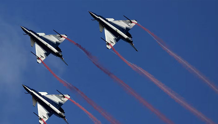 Chinas J-10 fighter jets from the Peoples Liberation Army Air Force August 1st Aerobatics Team perform during a media demonstration at the Korat Royal Thai Air Force Base, Nakhon Ratchasima province, Thailand, November 24, 2015.—Reuters
