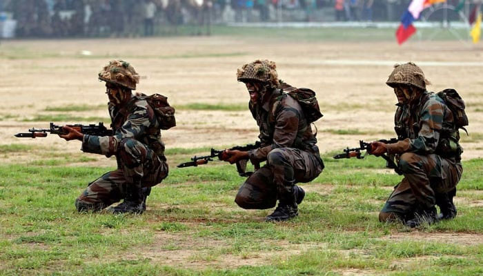Indian Army soldiers participate in a war exercise during a two-day Know Your Army exhibition in Ahmedabad, India, August 19, 2016. — Reuters