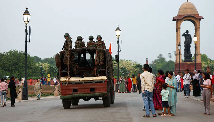 Military personnel with Indian Army stand guard at India Gate in New Delhi, India, May 8, 2025. — Reuters