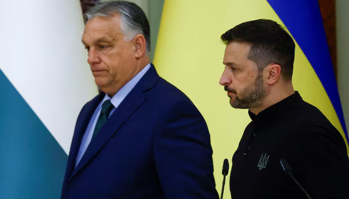 Hungarys Prime Minister Viktor Orban and Ukrainian President Volodymyr Zelenskiy arrive for a joint news briefing, amid Russias attack on Ukraine, in Kyiv, Ukraine July 2, 2024. — Reuters