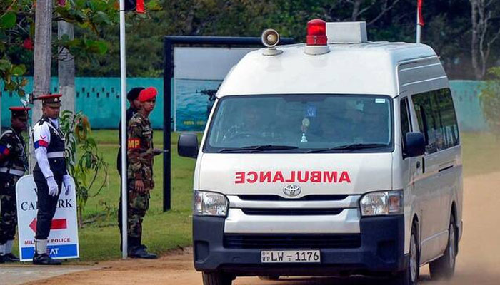 An ambulance transports victims of a helicopter crash, in Maduru Oya, east of capital Colombo. — AFP/File