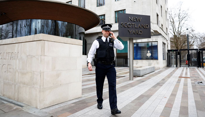 A police officer walks outside New Scotland Yard, the headquarters of the Metropolitan Police, in London, Britain March 21, 2023. — Reuters