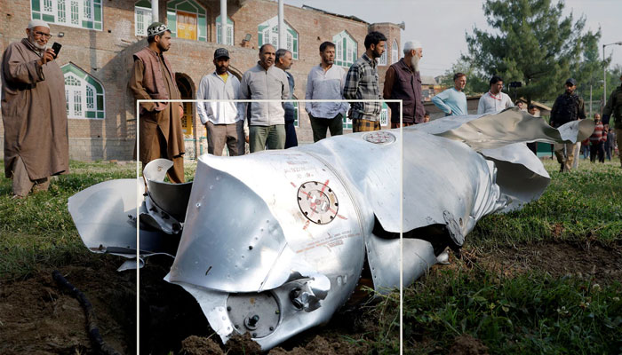 Metal debris lies on the ground in Wuyan in India-Occupied Kashmirs Pulwama district on Wednesday. —Reuters/File