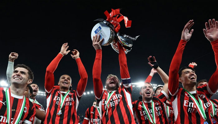 AC Milan players celebrating. —AFP/File