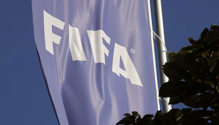 A flag with the logo of FIFA flies in front of its headquarters in Zurich, Switzerland August 5, 2020. — Reuters