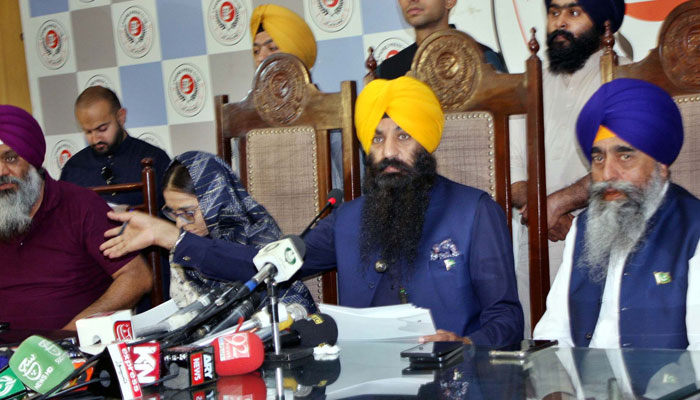 Punjab Minister for Minority Affairs, Sardar Ramesh Singh Arora along with others addresses to media persons during a press conference at Lahore press club on May 10, 2025. — PPI