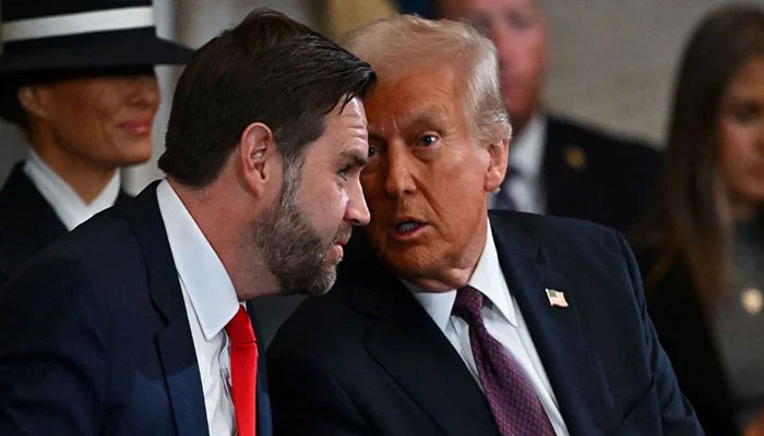 Vice President of the US JD Vance (left) and President of the US Donald Trump converse during the inauguration ceremonies in the Rotunda of the US Capitol on January 20, 2025 in Washington, DC. — Reuters
