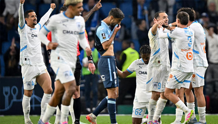 Marseille players celebrating. —AFP/File