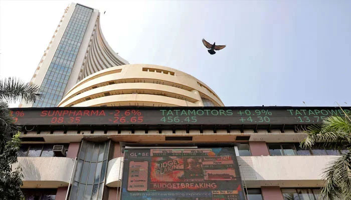 A bird flies past a screen displaying the Sensex results on the facade of the Bombay Stock Exchange (BSE) building in Mumbai, February 1, 2023.—Reuters