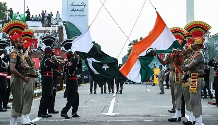 Pakistani Rangers take part in the beating retreat ceremony on the occasion of Pakistans Independence Day and eve of Indias Independence Day at the India-Pakistan Wagah border post on August 14, 2024. — AFP