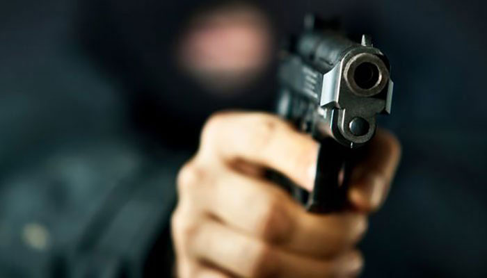 A representational image of a robbery at gunpoint. — APP/File
