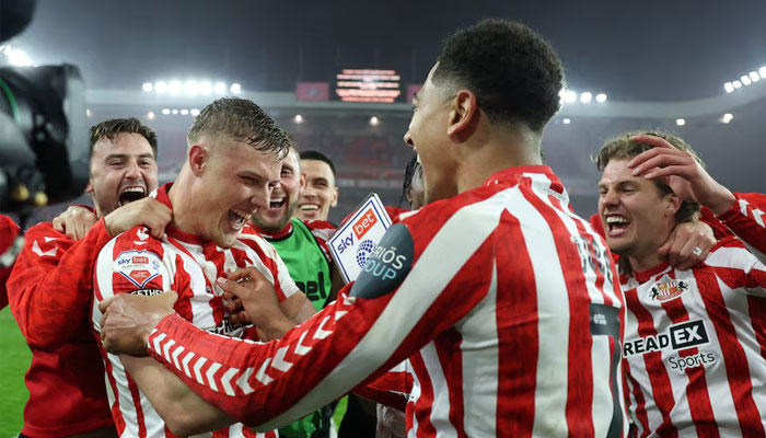 Sunderlands Jobe Bellingham and Daniel Ballard celebrate with teammates after the match. —Reuters/File