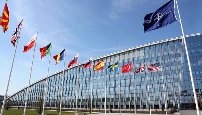 National flags representing the members of the Nato defence alliance flying at the alliances headquarters in Brussels.—Reuters/File