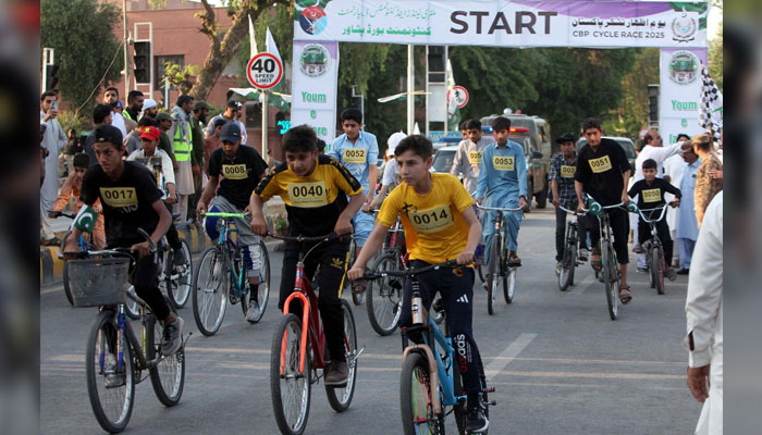 Cyclists pass through a road during the Youm-e-Tashakur (Day of Gratitude) organized by Cantonment Board in Peshawar on May 16, 2025. — PPI