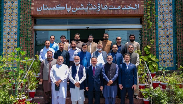 Turkish Ambassador in Pakistan, Dr Irfan Neziro lu (centre) in a group photo during his visit to the main office of the Al-Khidmat Foundation (AKF) Pakistan on May 16, 2025. — Facebook@alkhidmat.org