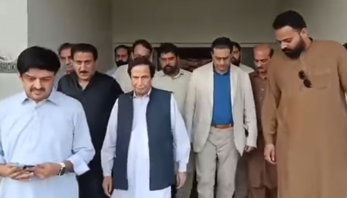 PTI President Chaudhry Pervaiz Elahi (centre left) and senior leader Salman Akram Raja (centre right) visit Punjab Institute of Cardiology to inquire after party Vice Chairman Shah Mehmood Qureshi on May 18, 2025. — Screengrab via Facebook@PTIOfficialKWL
