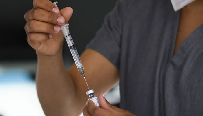 This representational image shows a physician assistant prepares a syringe.— AFP/File
