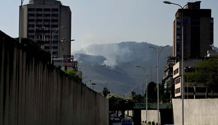 A view of smoke emitting after fire erupts at Margalla Hills in Islamabad on May 19, 2025. — APP