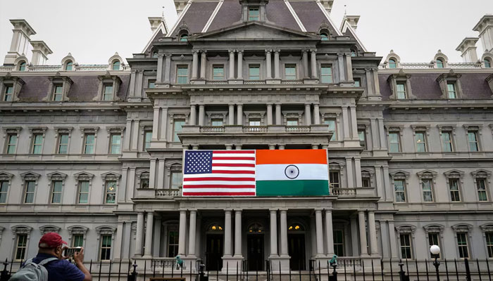 The flags of the United States and India are displayed on the Eisenhower Executive Office Building at the White House in Washington, US, June 21, 2023.—Reuters